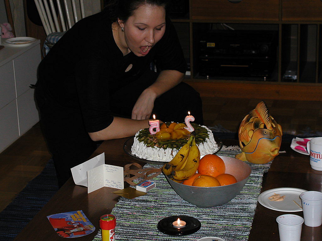 Minttu blowing the candles